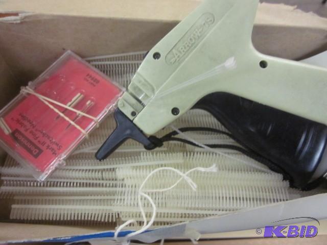 lot 106 image: Dennison and Arrow fabric tag faste...