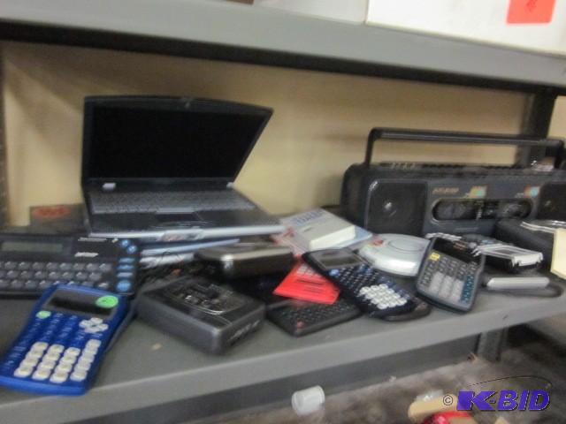 lot 156 image: Entire shelf of electronics, includ...