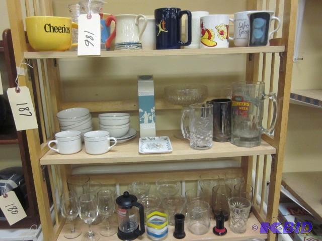 lot 186 image: Entire book shelf of glass and mugs...