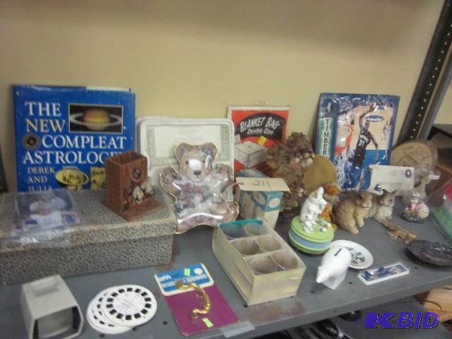 lot 211 image: Entire shelf of items, including vi...