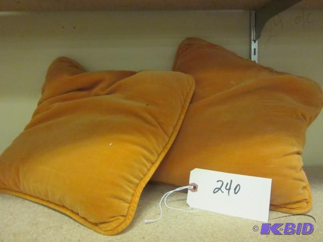 lot 240 image: Pair of orange accent pillows....
