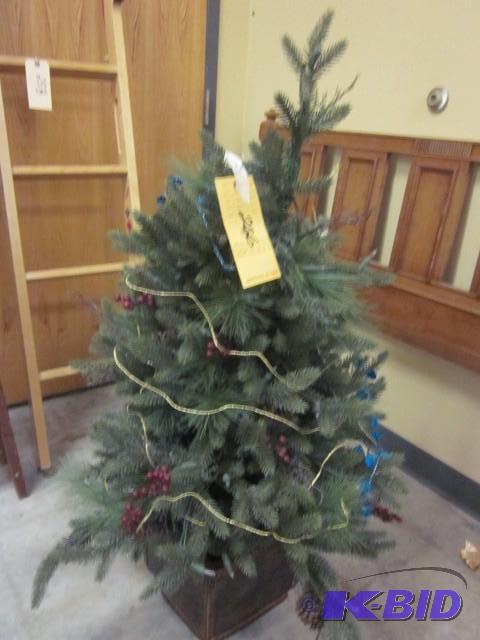 lot 266 image: 4 foot Christmas tree with stand....