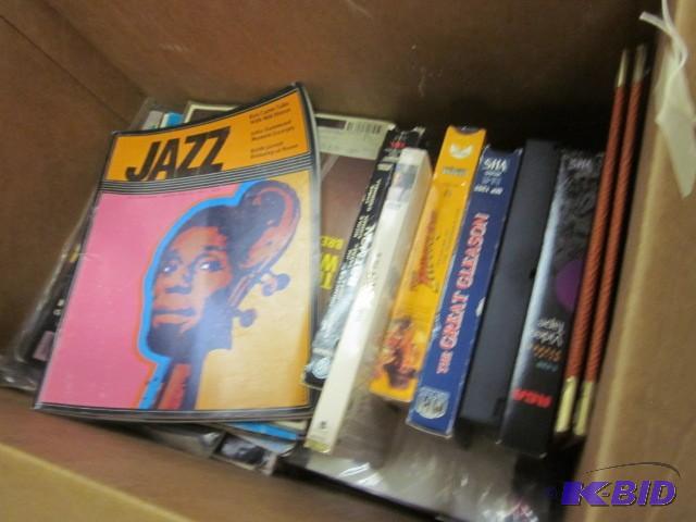 lot 284 image: Box of old magazines and VHS tapes....
