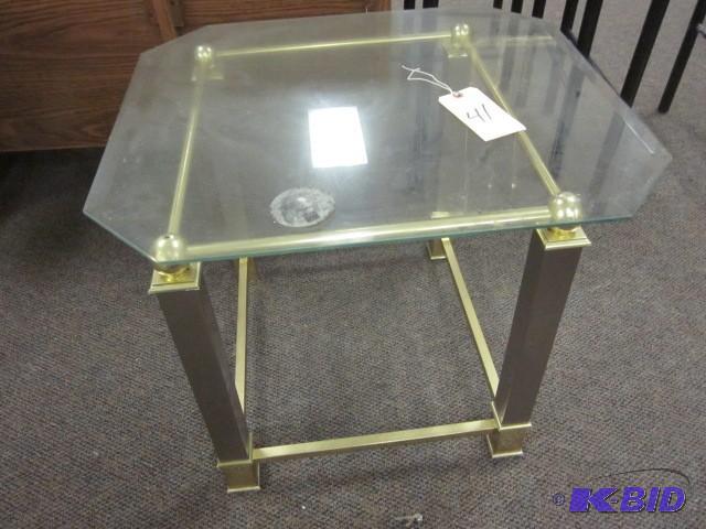lot 41 image: Brass and glass end table.  ...