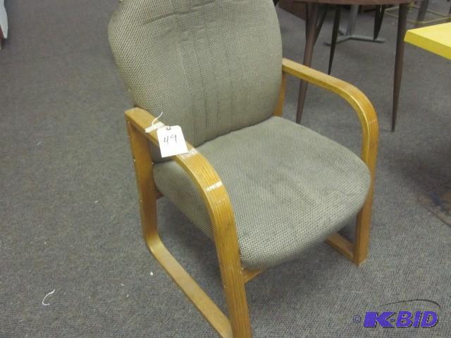 lot 49 image: Euro style wood and cloth chair....