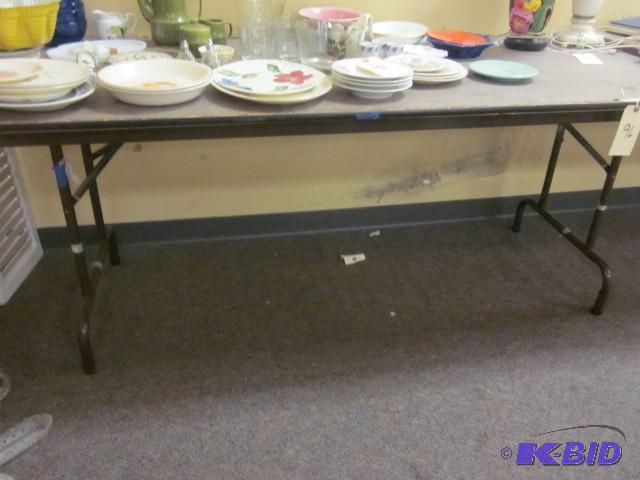 lot 96 image: 6 foot banquet table. Items on tabl...