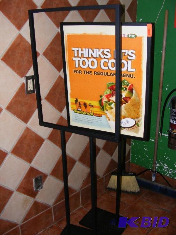 Two (2) Floor Sign Racks...