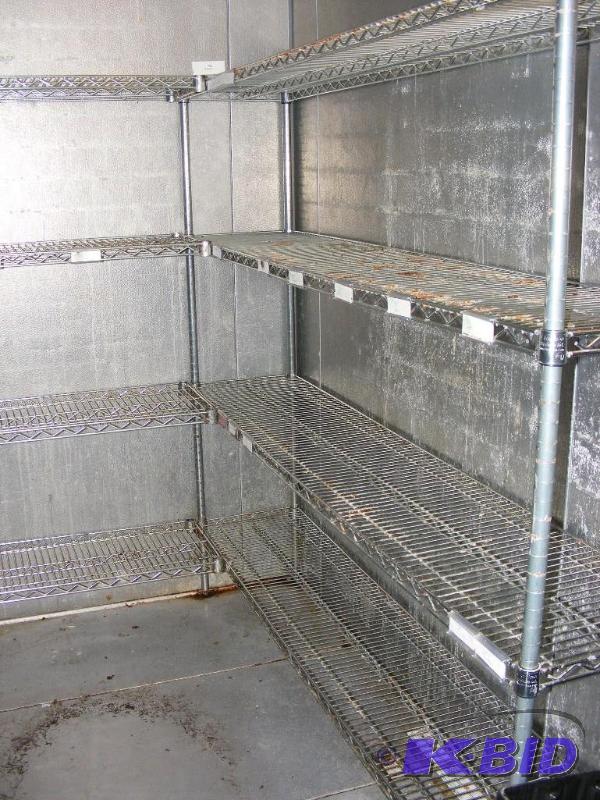 U shaped shelving set up in the coo...