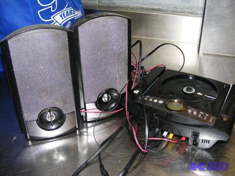 CD player, missing lid with speaker...