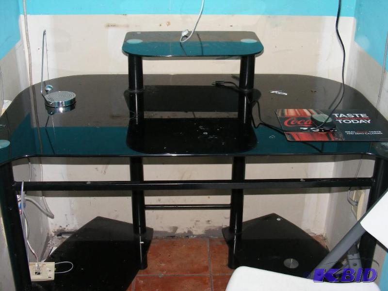office desk and chair, desk is blac...