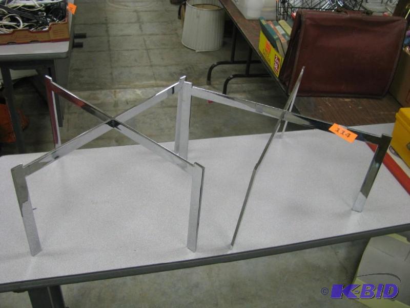 two metal display risers...