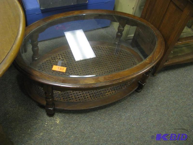 oval coffee table with glass top, w...