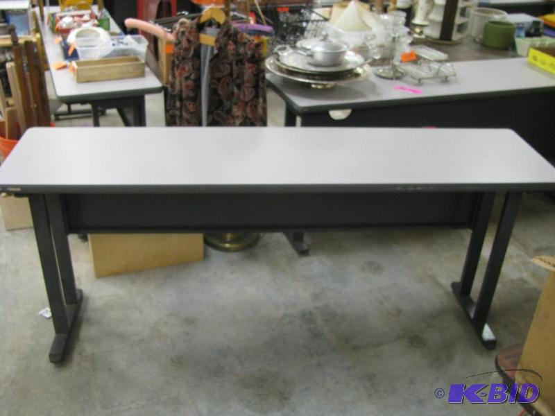 Metal folding table, many uses incl...