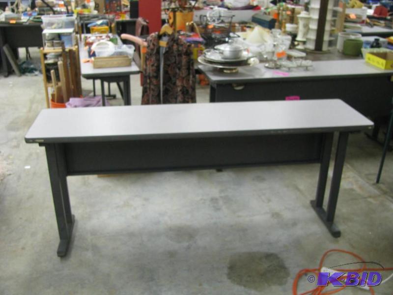 Metal folding table, many uses incl...