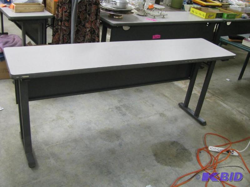 Metal folding table, many uses incl...