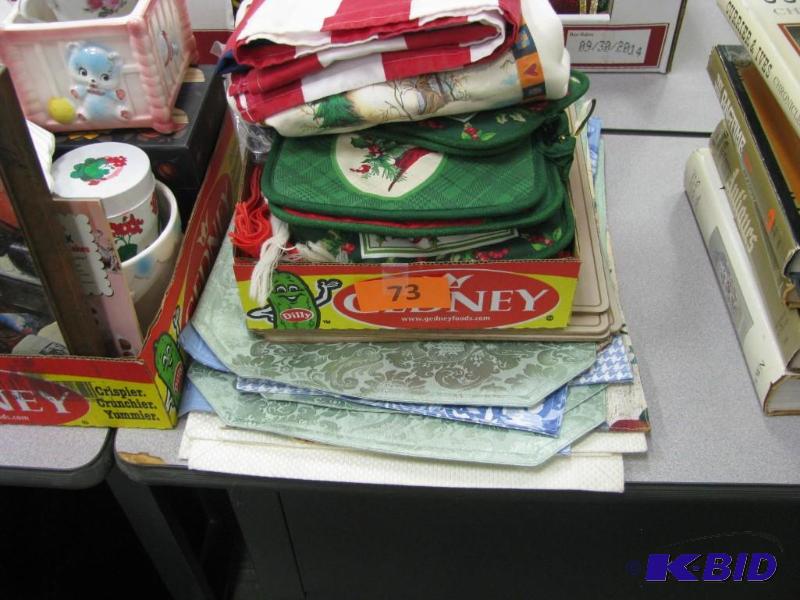collection of placemats, pot holder...