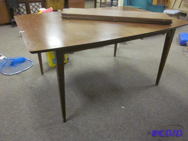 60 inch x 42 inch mid century table...