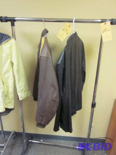 Metal garment rack on wheels. Items...
