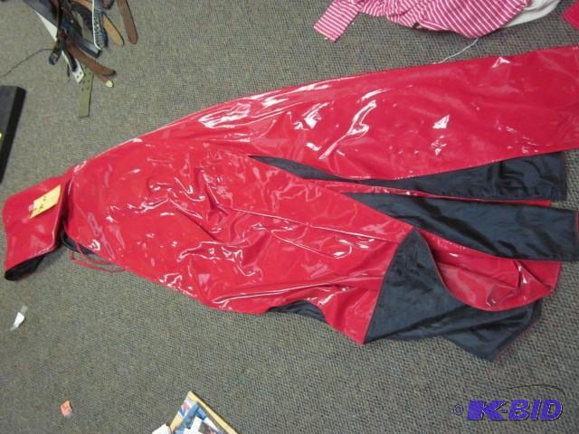 Red vinyl hooded cape. &nbsp...