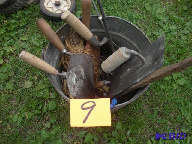 lot 9 image: Pail full of cement tools.. pail in...