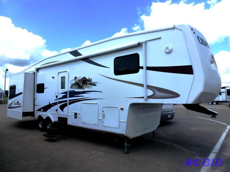 lot 6 image: 2009 Forest River Cedar Creek 36RLTS 5th Wheel Camper Triple Slide-Out Loaded