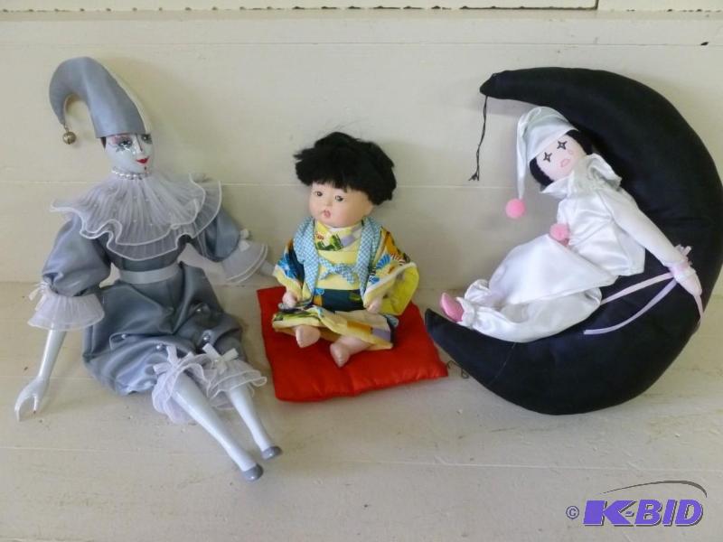 lot 123 image: Lot of three collector dolls....