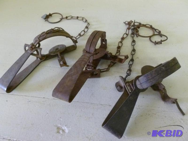 lot 128 image: Lot of three Victor leg traps....