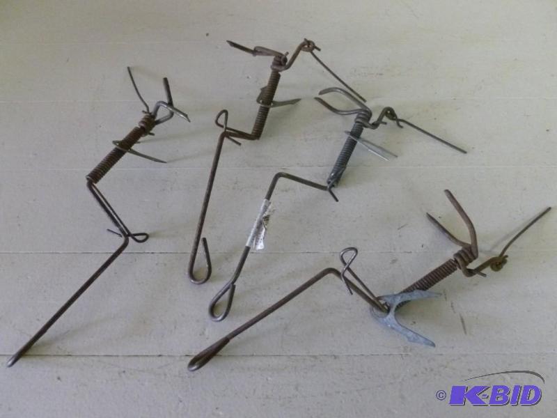 lot 129 image: Lot of four gopher traps....