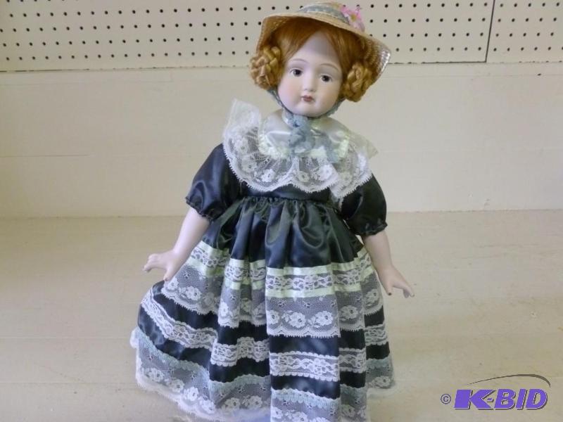 lot 135 image: Beautiful porcelain doll with stand...