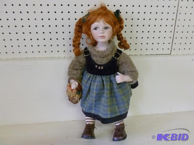 lot 138 image: Beautiful porcelain doll that measu...