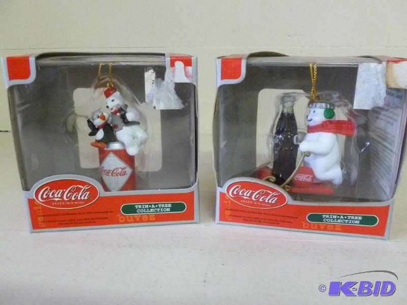 lot 180 image: Lot of two collectible Coca-Cola tr...