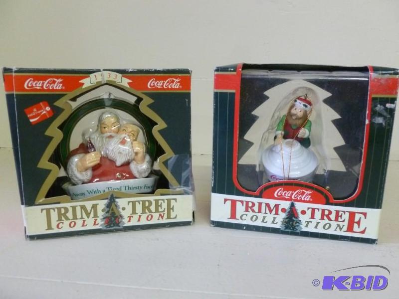 lot 181 image: Lot of two collectible Coca-Cola tr...
