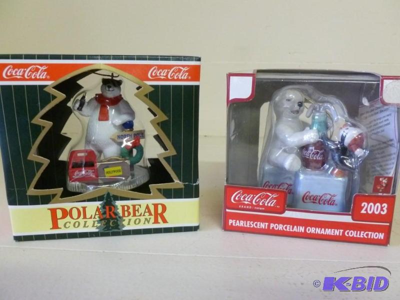 lot 182 image: Lot of two collectible Coca-Cola tr...