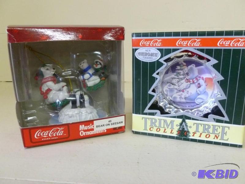 lot 183 image: Lot of two collectible Coca-Cola tr...