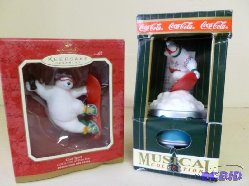 lot 184 image: Lot of two collectible Coca-Cola tr...