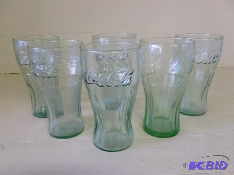 lot 202 image: Lot of six matching Coca-Cola embos...