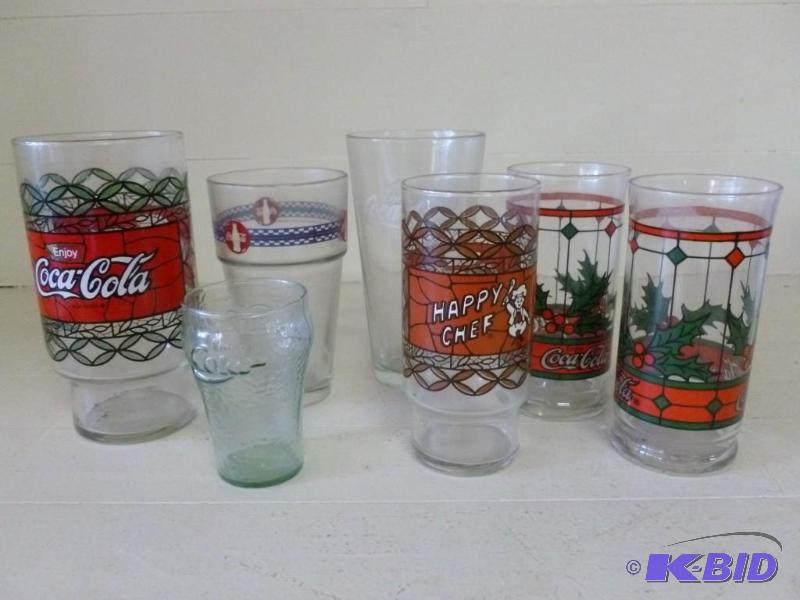 lot 207 image: Lot of seven mixed sized Coca-Cola ...