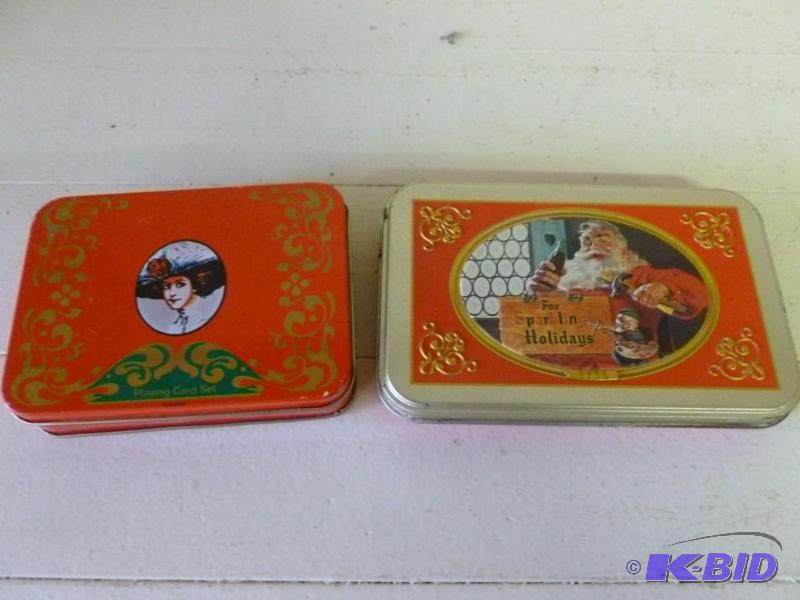 lot 219 image: Lot of two tins of Coca-Cola playin...