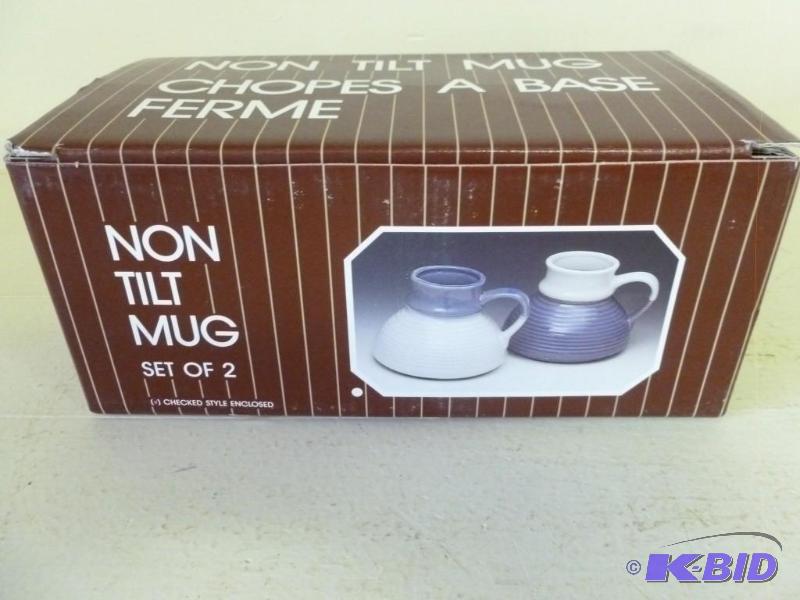 lot 255 image: Set of two porcelain non tilt mugs,...