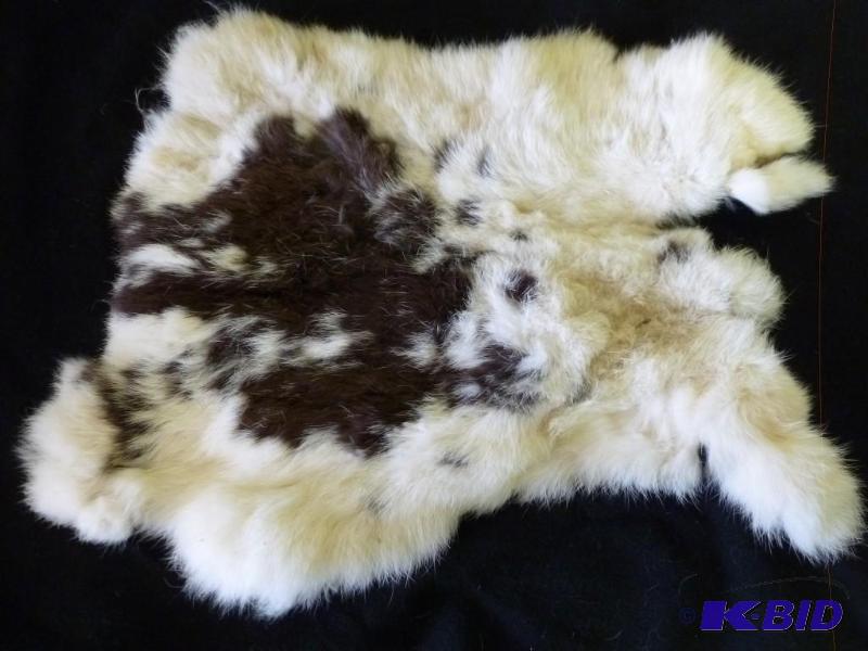 lot 277 image: Rabbit fur, tanned and stretched, m...