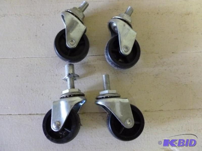 lot 290 image: Lot of four heavy duty 2" cast...