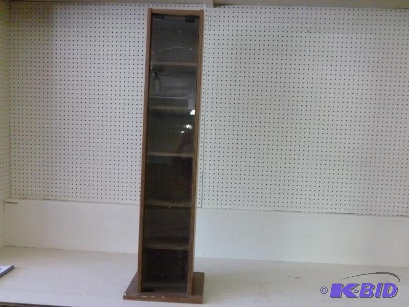 lot 30 image: Wood laminate five tiered DVD cabin...