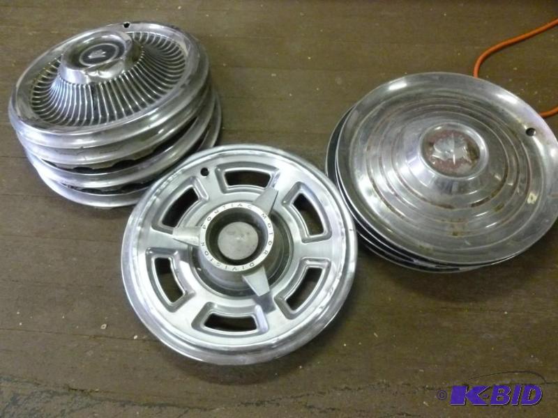 lot 328 image: Lot of nine vintage hub caps....
