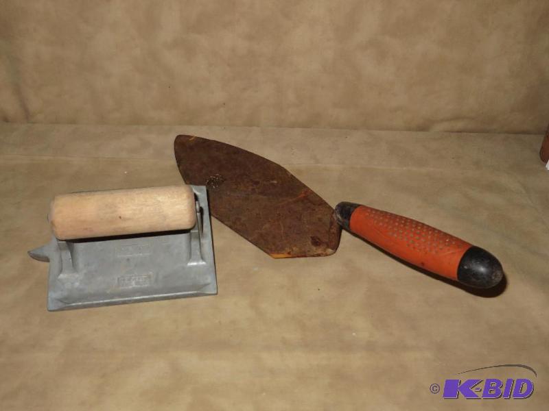 A crevice trowel and a trowel for C...