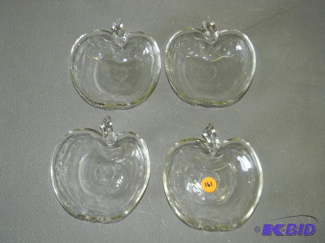 Four apple shaped candy dishes...