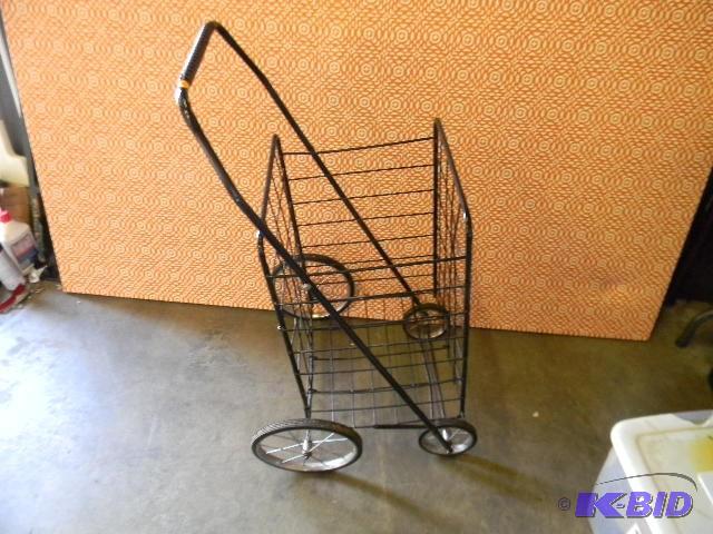 Black metal folding cart on wheels...