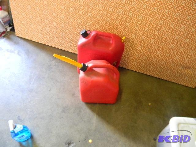 Lot of 2 gas cans - 5 gallon and 6 ...