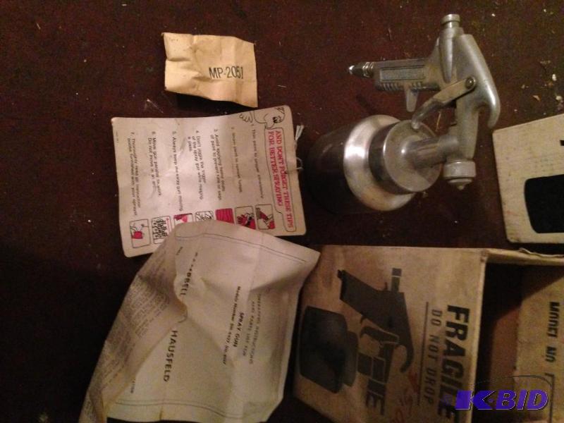 lot 24 image: Paint Sprayer With parts and books...