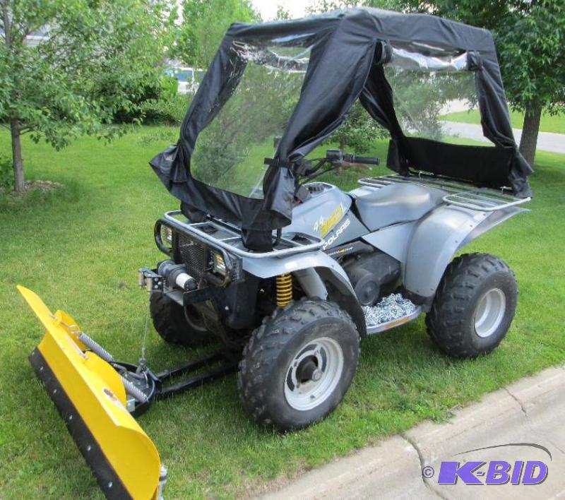 For sale is a nice clean and well m... Polaris 4x4 ATV With Plow, Cab