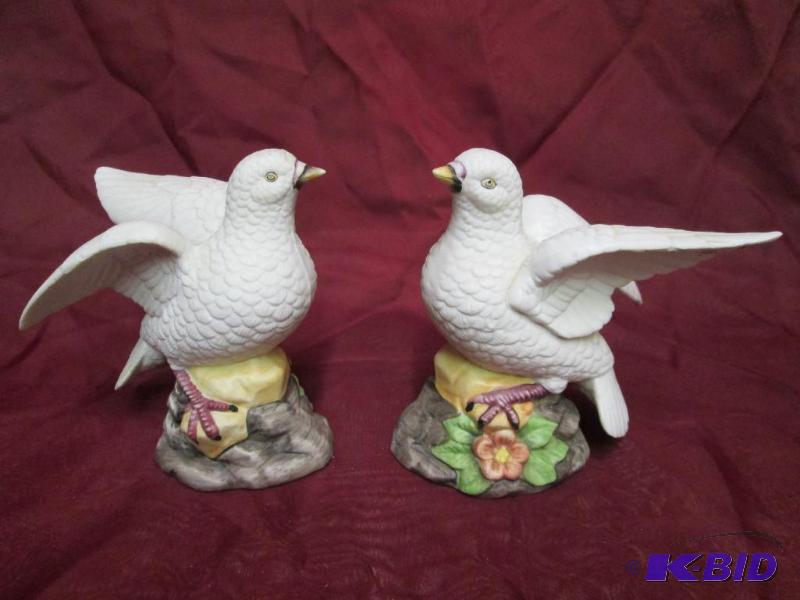 Pair of bisque porcelain doves sitt...